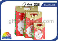 Customized Christmas Gift Packaging Bag with Die Cut Handles Ribbon Bowknot